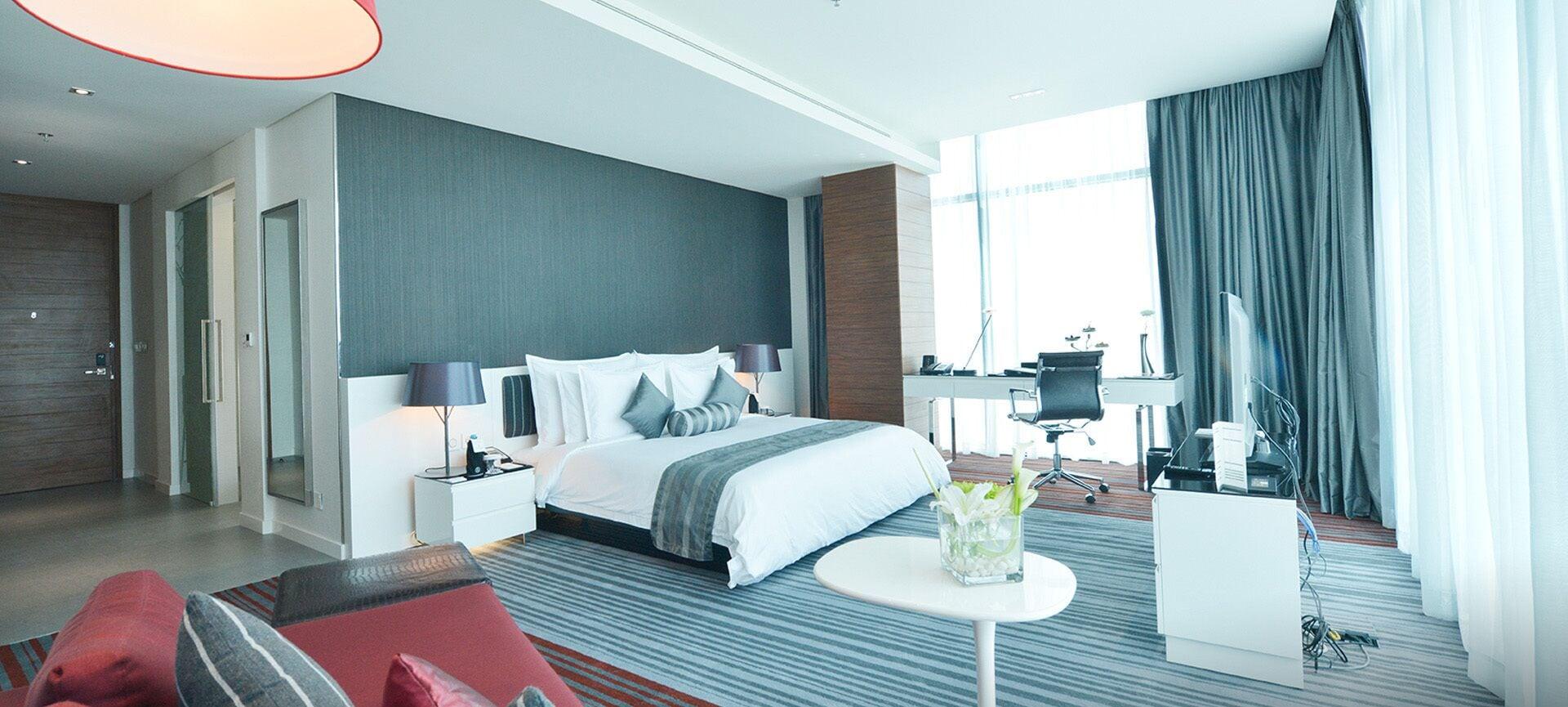 Ramee Grand Hotel And Spa Manama Exterior foto A bedroom in a hotel