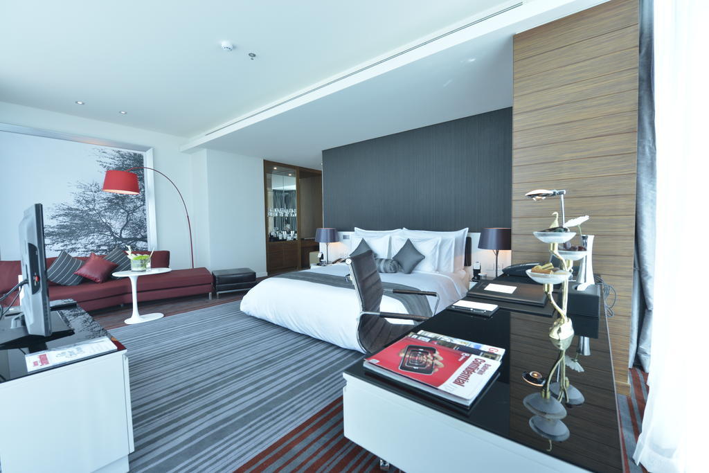 Ramee Grand Hotel And Spa Manama Quarto foto A bedroom at the hotel