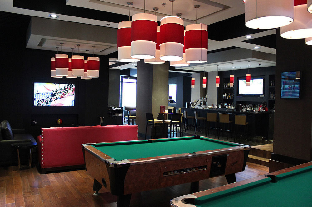 Ramee Grand Hotel And Spa Manama Exterior foto The Sports Bar at the Toronto International Centre